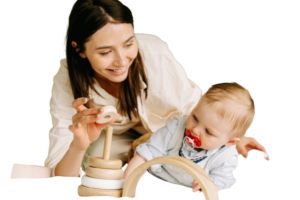 image of mother with infant having pacifier on his mouth