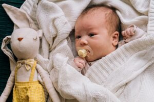 image of baby having basic newborn essentials